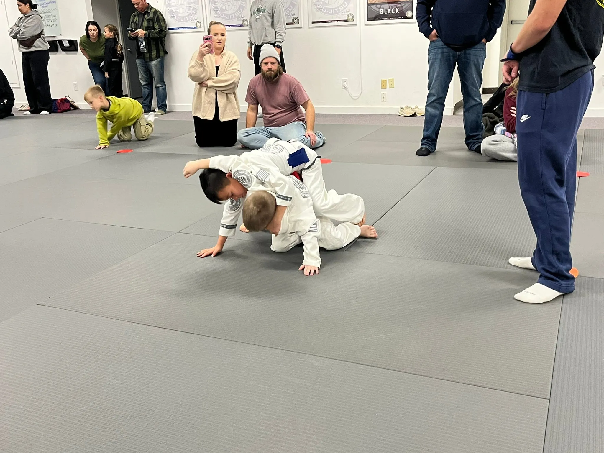 Two of the youngest students drilling on the mat at Dynamic Martial Arts