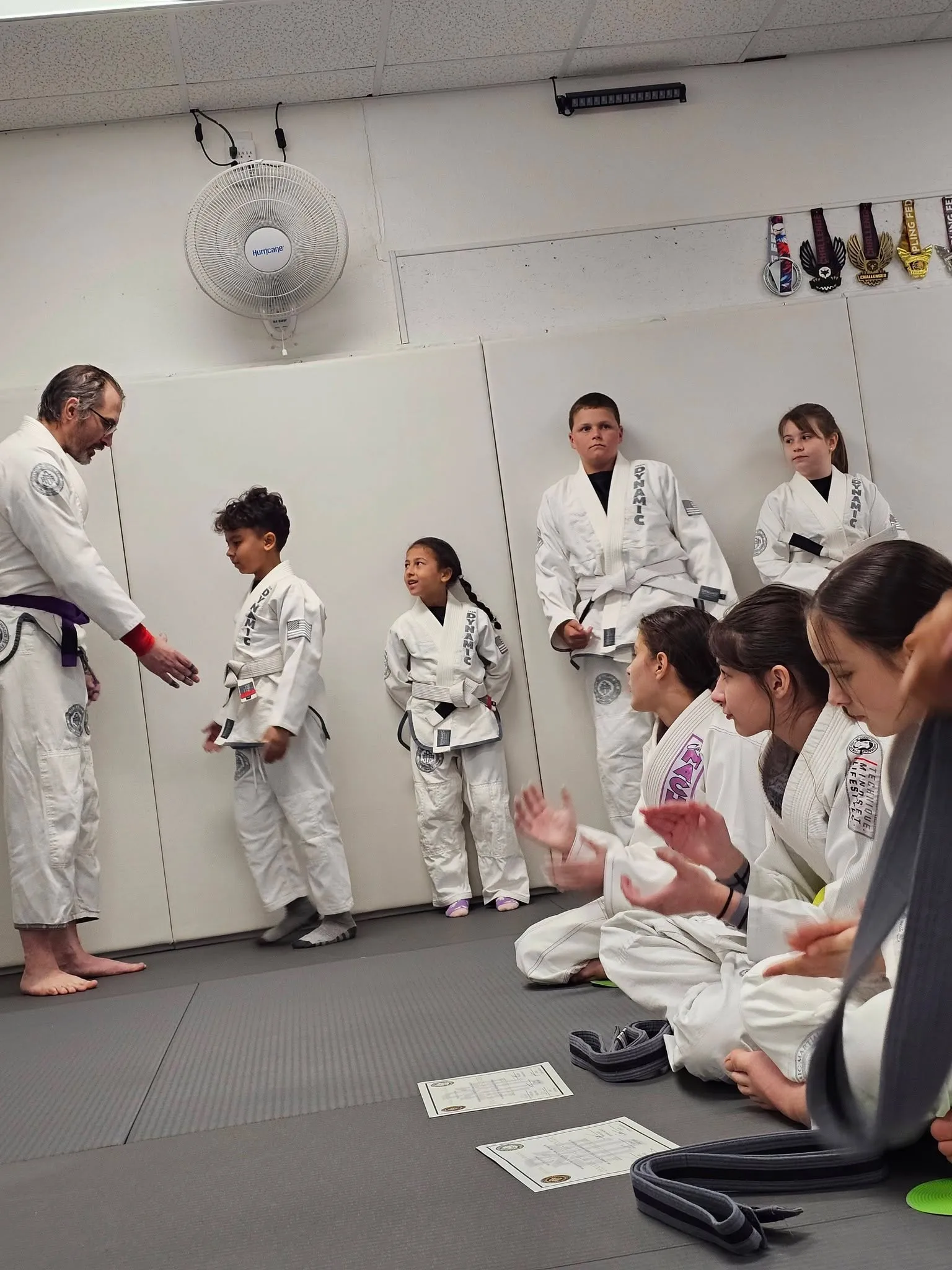 Cubs students on the mat with their coach at Dynamic Martial Arts in Wichita Falls, TX